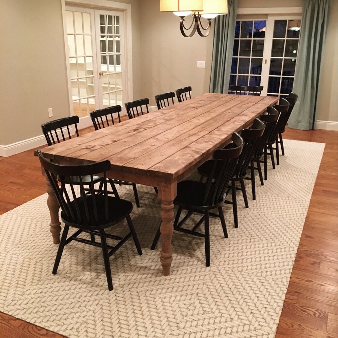 Handcrafted farmhouse table made from real wood, perfect for rustic charm. Ideal for family gatherings and cozy dinners. Custom sizes available. Long farmhouse table, large farm table, handmade table, turned leg table